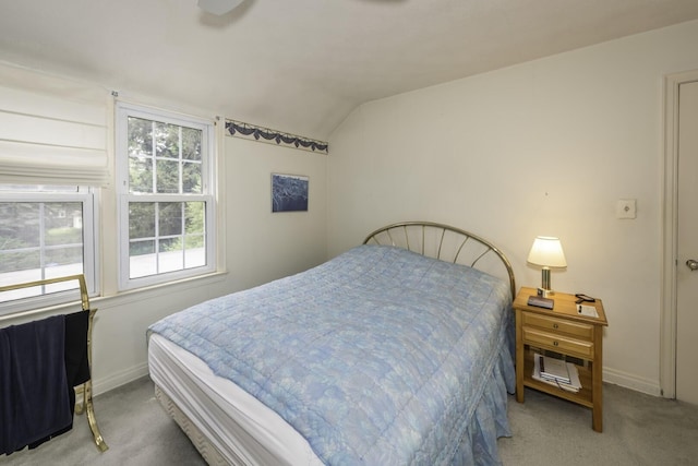 1217 Westmoorland St, Ypsilanti, MI 48197 - carpeted bedroom featuring vaulted ceiling and baseboards
