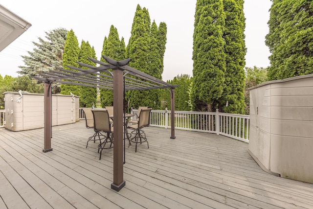 5835 S Ashford Way, Ypsilanti, MI 48197 - wooden deck with a pergola and outdoor dining area