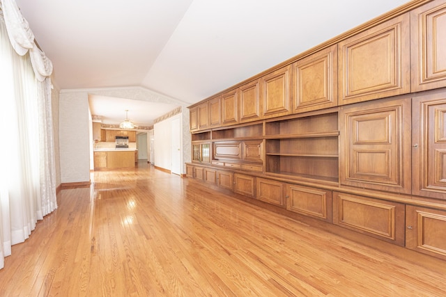 5835 S Ashford Way, Ypsilanti, MI 48197 - unfurnished living room featuring light wood-type flooring and vaulted ceiling