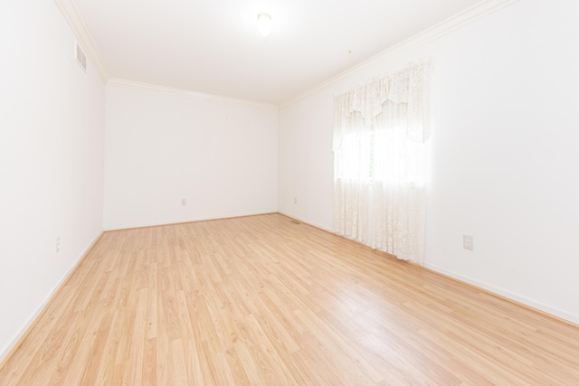 5835 S Ashford Way, Ypsilanti, MI 48197 - spare room with ornamental molding and wood finished floors