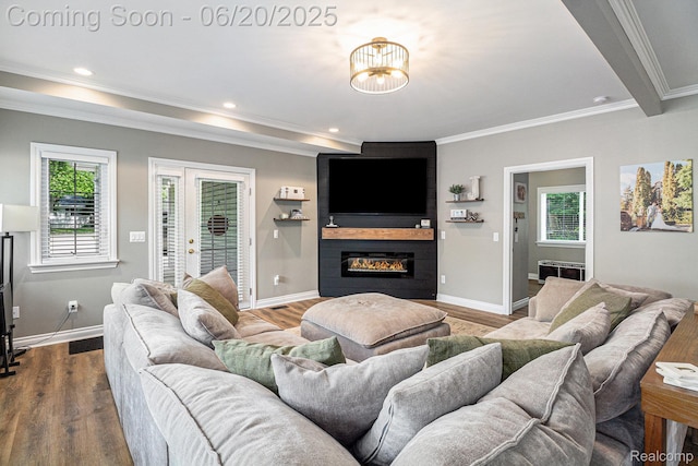 3280 Chambourne St, Ferndale, MI 48382 - living area with ornamental molding, wood finished floors, a large fireplace, a chandelier, and recessed lighting