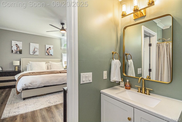 3280 Chambourne St, Ferndale, MI 48382 - ensuite bathroom featuring wood finished floors, vanity, crown molding, and a ceiling fan