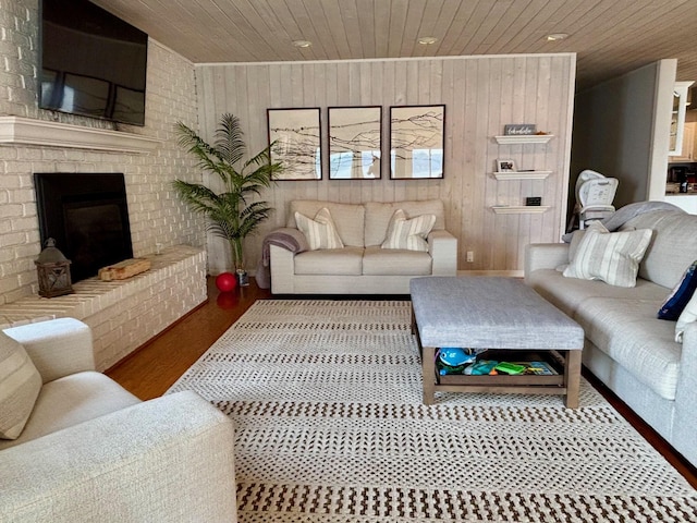 68121 Edgewater Beach Rd, White Pigeon, MI 49099 - living area with wood ceiling, recessed lighting, wood walls, wood finished floors, and a fireplace