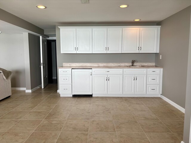 68121 Edgewater Beach Rd, White Pigeon, MI 49099 - kitchen featuring light countertops, white cabinetry, recessed lighting, and light tile patterned floors