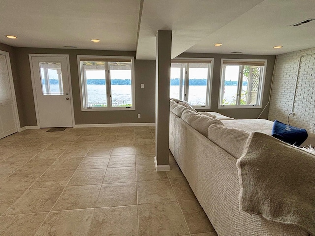 68121 Edgewater Beach Rd, White Pigeon, MI 49099 - living area with healthy amount of natural light, a water view, light tile patterned floors, and recessed lighting