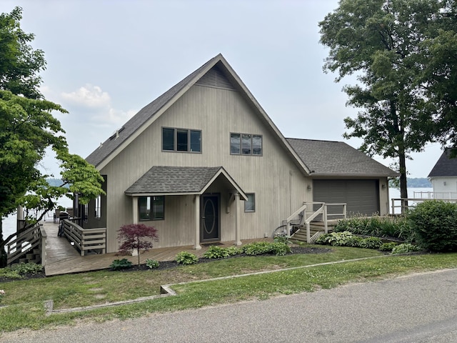 68121 Edgewater Beach Rd, White Pigeon, MI 49099 - view of front of property with roof with shingles and an attached garage