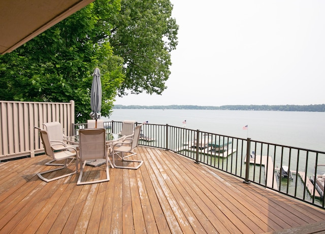 68121 Edgewater Beach Rd, White Pigeon, MI 49099 - wooden deck featuring a water view and outdoor dining area