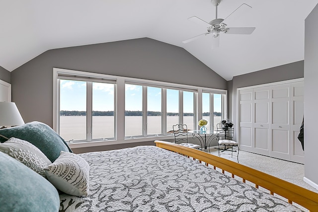 68121 Edgewater Beach Rd, White Pigeon, MI 49099 - bedroom featuring vaulted ceiling, a water view, a closet, carpet, and a ceiling fan