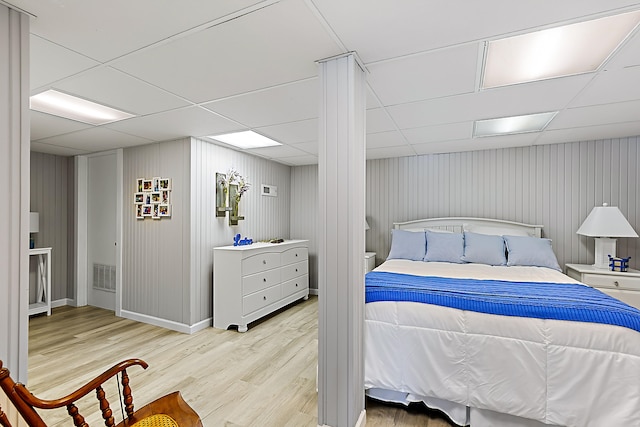 68121 Edgewater Beach Rd, White Pigeon, MI 49099 - bedroom featuring a paneled ceiling and wood finished floors
