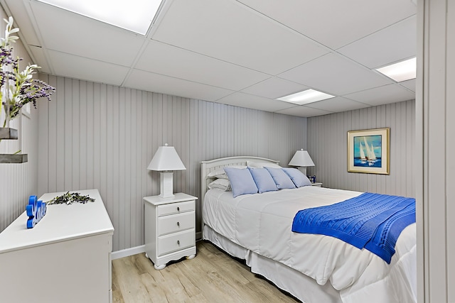 68121 Edgewater Beach Rd, White Pigeon, MI 49099 - bedroom with a drop ceiling and light wood-type flooring