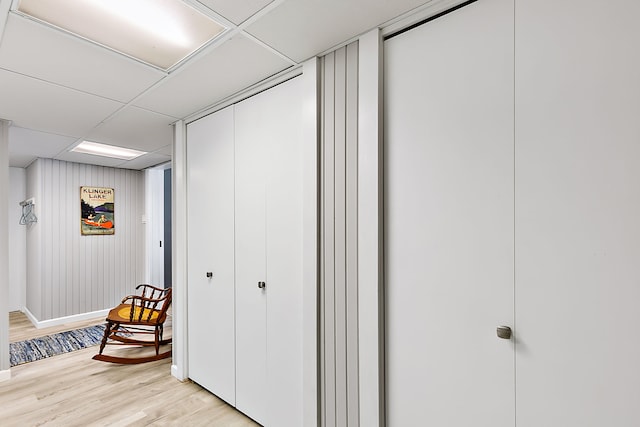 68121 Edgewater Beach Rd, White Pigeon, MI 49099 - hallway featuring light wood finished floors and a drop ceiling