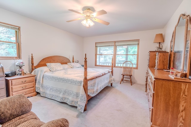 7111 Gilbert Rd, Pittsford, MI 49271 - bedroom with light colored carpet and a ceiling fan