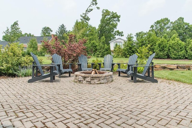 5284 Green Pine Ln, Kalamazoo, MI 49009 - view of patio / terrace with an outdoor fire pit