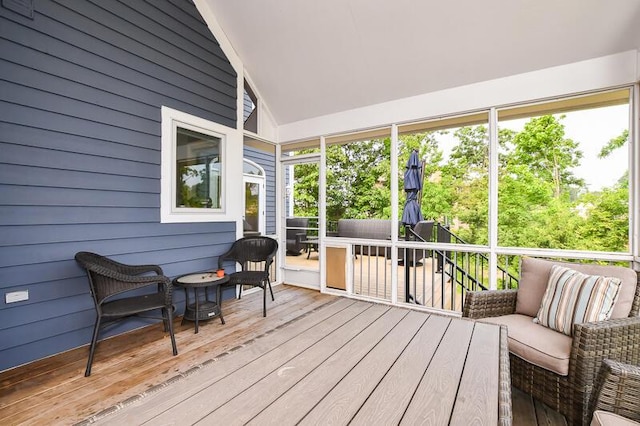 5284 Green Pine Ln, Kalamazoo, MI 49009 - sunroom featuring lofted ceiling and an outdoor living space