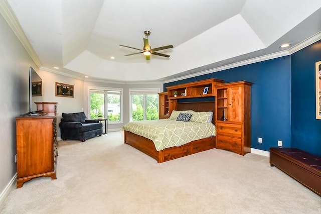 5284 Green Pine Ln, Kalamazoo, MI 49009 - bedroom with a tray ceiling, light carpet, crown molding, recessed lighting, and ceiling fan
