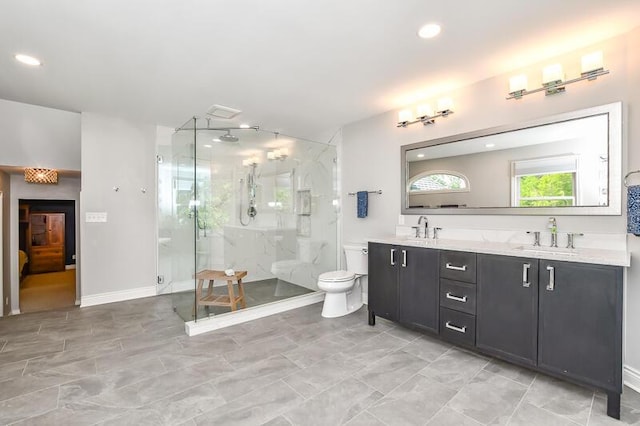 5284 Green Pine Ln, Kalamazoo, MI 49009 - full bath with a marble finish shower, double vanity, and recessed lighting