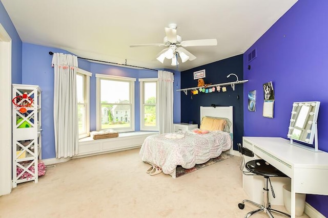 5284 Green Pine Ln, Kalamazoo, MI 49009 - bedroom with carpet floors, a desk, and a ceiling fan