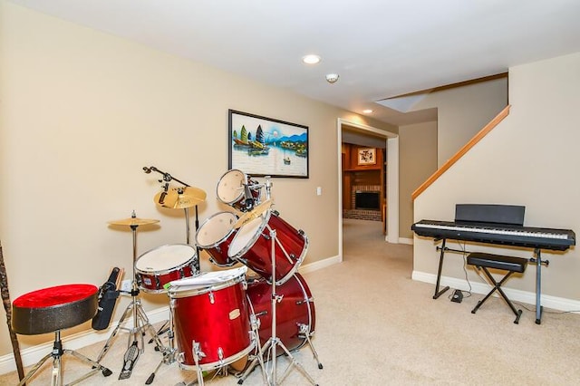 5284 Green Pine Ln, Kalamazoo, MI 49009 - recreation room featuring carpet floors, a fireplace, and recessed lighting