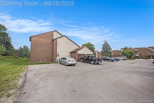 6700 Ridgefield Cir Unit 201, West Bloomfield, MI 48322 - view of uncovered parking lot