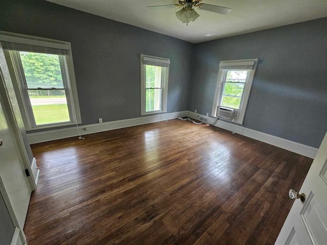 20051 Capital Ave NE, Battle Creek, MI 49017 - spare room featuring ceiling fan, hardwood / wood-style flooring, and cooling unit