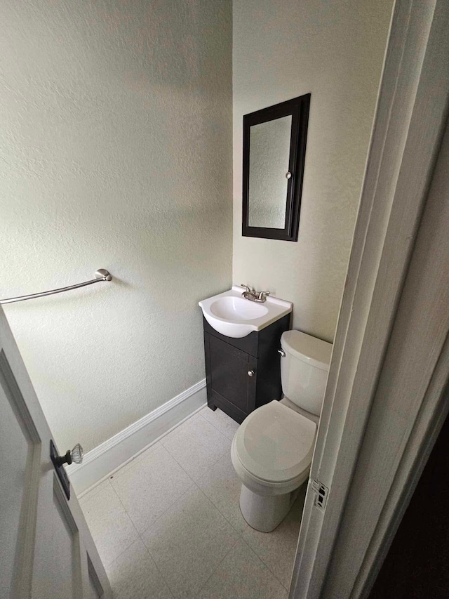20051 Capital Ave NE, Battle Creek, MI 49017 - bathroom featuring vanity and toilet