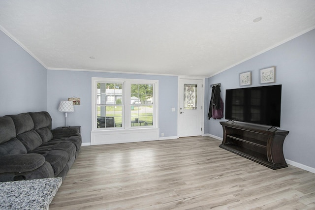 42 S 25th St, Battle Creek, MI 49015 - living area featuring ornamental molding, light wood finished floors, and lofted ceiling