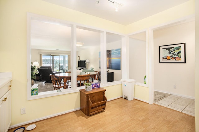 225 W Columbia Ave Unit 6, Battle Creek, MI 49015 - living room featuring light wood finished floors and baseboards