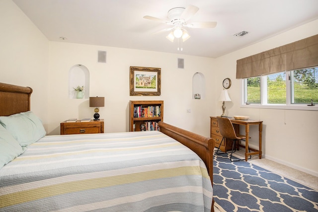 225 W Columbia Ave Unit 6, Battle Creek, MI 49015 - carpeted bedroom featuring baseboards and a ceiling fan