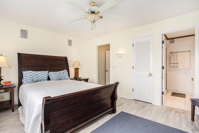 225 W Columbia Ave Unit 6, Battle Creek, MI 49015 - bedroom with light wood-style flooring, attic access, ceiling fan, and connected bathroom