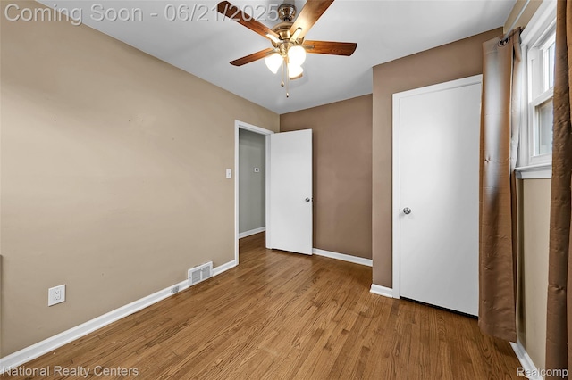 3572 Tyler Ave, Berkley, MI 48072 - unfurnished bedroom with wood finished floors and ceiling fan