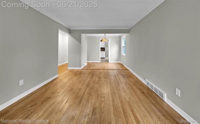 3572 Tyler Ave, Berkley, MI 48072 - empty room featuring ornamental molding and light wood-style floors