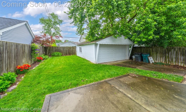 3572 Tyler Ave, Berkley, MI 48072 - fenced backyard with a detached garage and an outbuilding