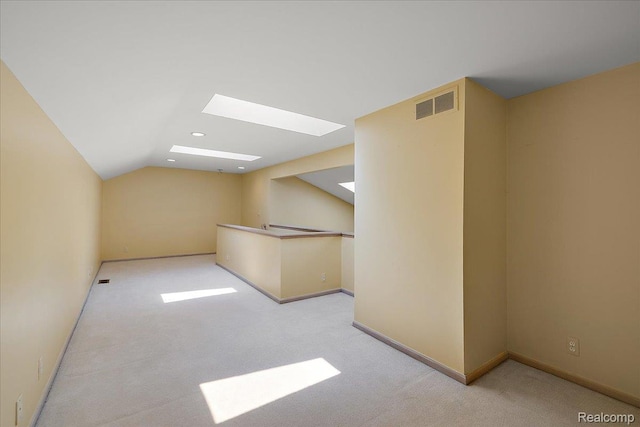 55728 Lorraine Dr Unit 20, Utica, MI 48316 - bonus room featuring a skylight, carpet flooring, lofted ceiling, and recessed lighting