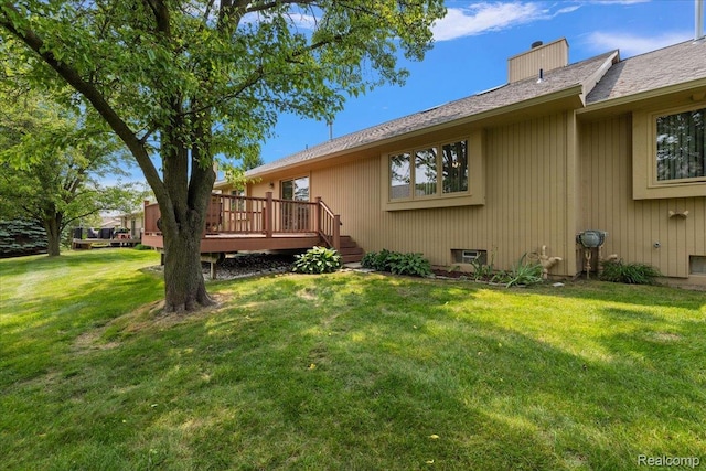 55728 Lorraine Dr Unit 20, Utica, MI 48316 - view of grassy yard featuring a wooden deck