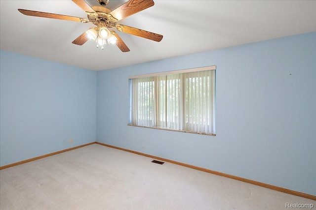 55728 Lorraine Dr Unit 20, Utica, MI 48316 - carpeted empty room with baseboards and a ceiling fan