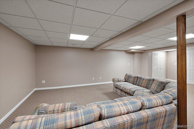 55728 Lorraine Dr Unit 20, Utica, MI 48316 - carpeted living room with baseboards and a paneled ceiling