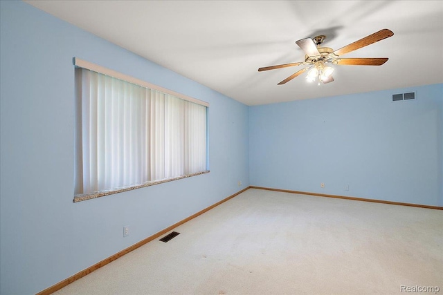 55728 Lorraine Dr Unit 20, Utica, MI 48316 - carpeted spare room featuring baseboards and a ceiling fan