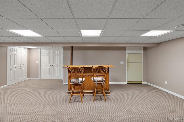 55728 Lorraine Dr Unit 20, Utica, MI 48316 - carpeted dining area with a dry bar and baseboards