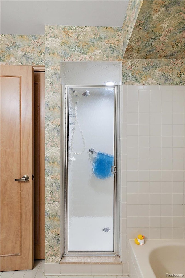 55728 Lorraine Dr Unit 20, Utica, MI 48316 - full bathroom with a stall shower, wallpapered walls, and a tub to relax in