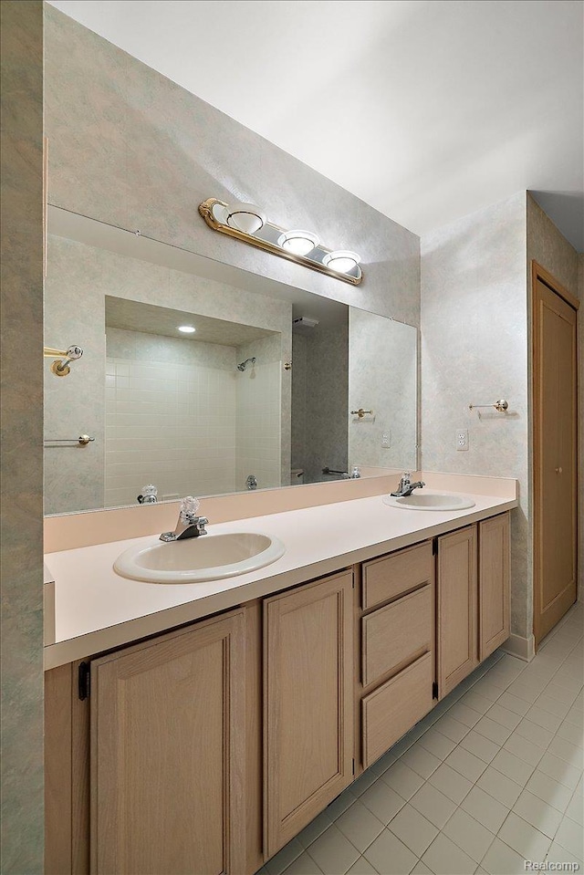 55728 Lorraine Dr Unit 20, Utica, MI 48316 - full bathroom featuring double vanity and tile patterned floors