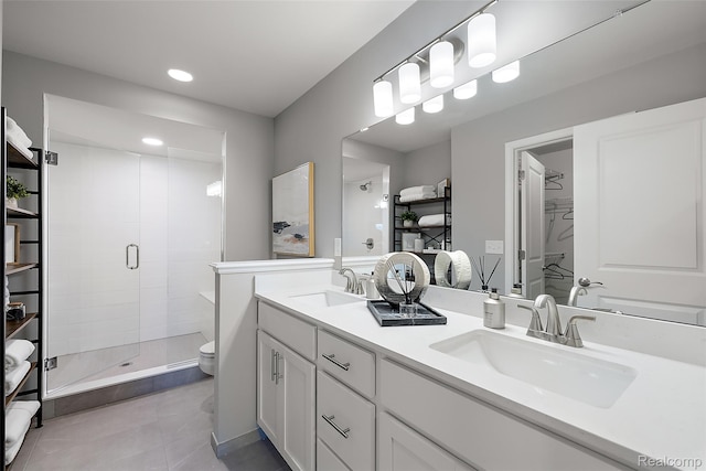 164 Jotham Ave, Auburn Hills, MI 48326 - full bath featuring double vanity, a shower stall, tile patterned floors, and recessed lighting