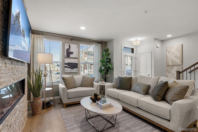 164 Jotham Ave, Auburn Hills, MI 48326 - living room featuring wood finished floors, recessed lighting, and a brick fireplace