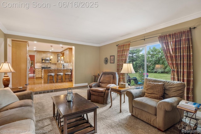 3184 Cedar Key Dr, Lake Orion, MI 48360 - living area with crown molding, light colored carpet, and light wood-style flooring