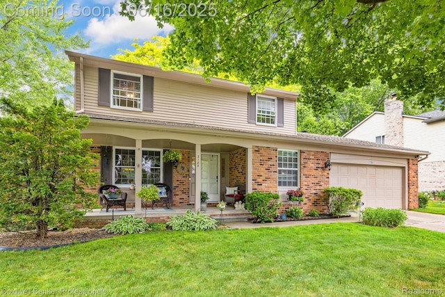 3184 Cedar Key Dr, Lake Orion, MI 48360 - traditional home with brick siding, driveway, a porch, a garage, and a front yard