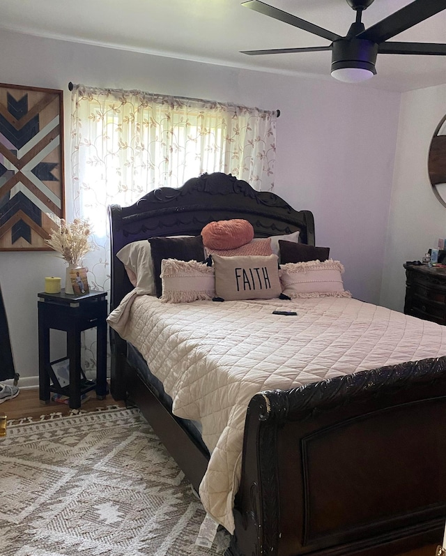 4236 Marianne Dr, Flushing, MI 48433 - bedroom featuring a ceiling fan and wood finished floors