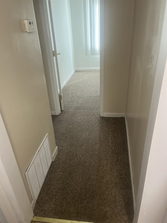 1021 2nd St, Flint, MI 48503 - corridor featuring carpet flooring and baseboards