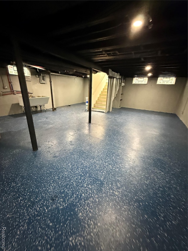 11735 Braile St, Detroit, MI 48228 - basement with a sink and stairs
