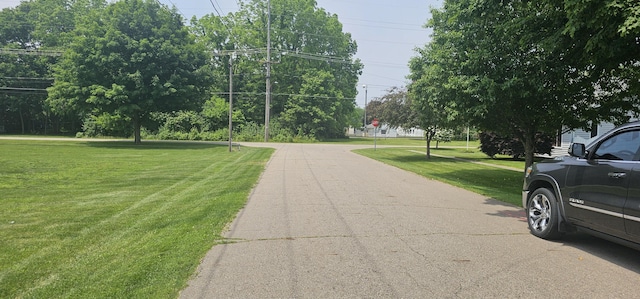 515 Osterhout St, Schoolcraft, MI 49087 - view of asphalt road with traffic signs