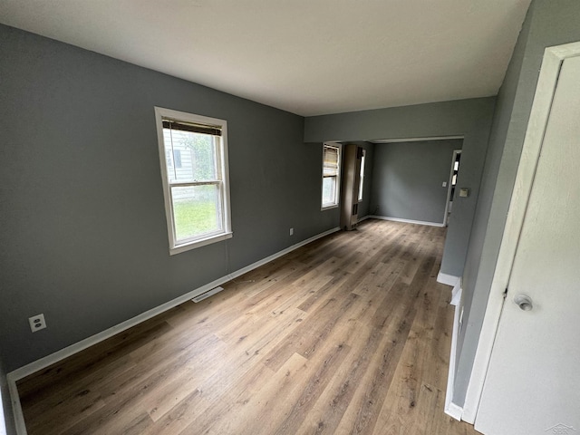 1807 Union Ave, Saginaw, MI 48602 - unfurnished room featuring wood finished floors and baseboards