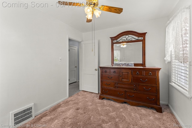 7652 Osage Ave, Allen Park, MI 48101 - bedroom with light carpet, multiple windows, and ceiling fan